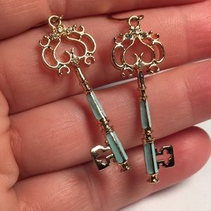 Gold tone crystal embellished blue enamel retro key pierced wire earrings
